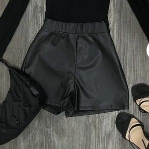 Black leather shorts